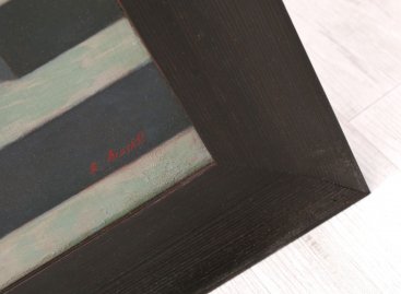 Detail hnědého rámu na historický obraz