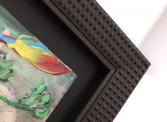 Neobvyklý rám s punkovým dekorem v černé barvě na obraz Michaela Rittsteina