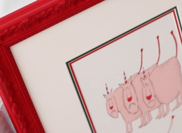 Detail orámování litografie. Syté barvy paspart (červená, zelená a krémová) korespondují s barevnou paletou díla Adolfa Borna