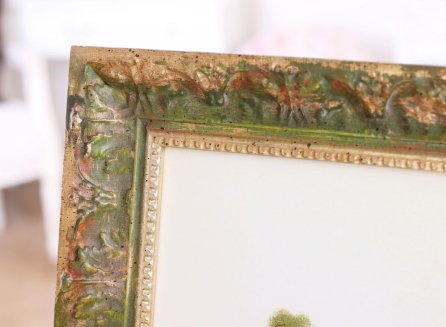 Zelený ornamentální rám s patinou a zlacením na plakát Jiřího Trnky - detail