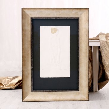 Malý reliéfní tisk Olbrama Zoubka zarámovaný ve stříbrném rámu s 3D efektem