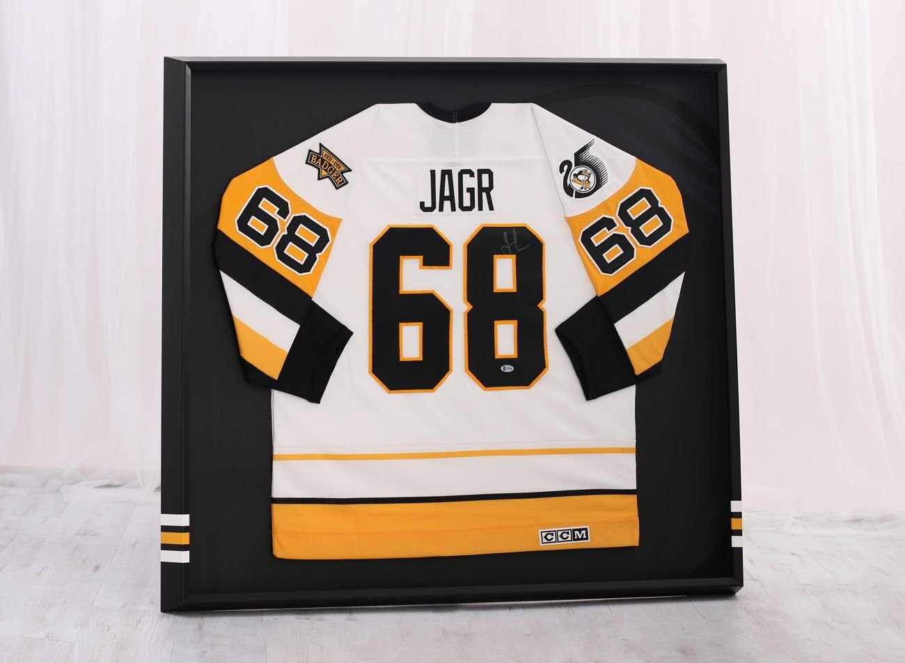 /WEB-galerie/06_Dresy/0001_Galerie/top/Ramovani_dresu_Jagr_Pittsburgh.jpg