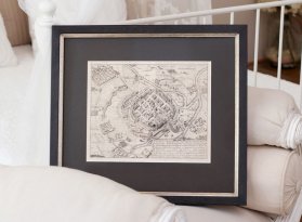 Muzeální rámování historické mapy Plzně