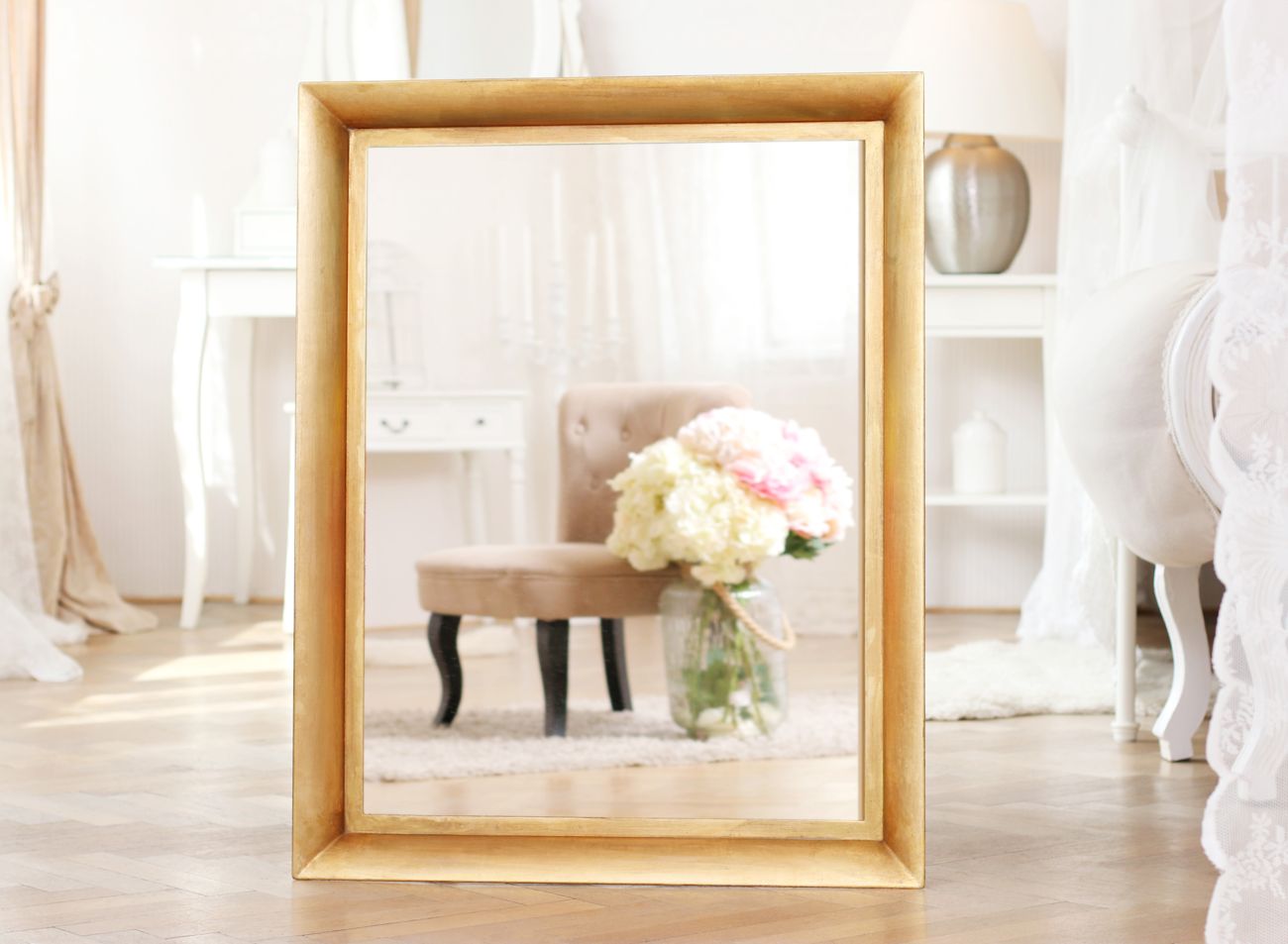 Luxusní zlaté zrcadlo tvaru otevřeného křídla | © Frame-it.cz