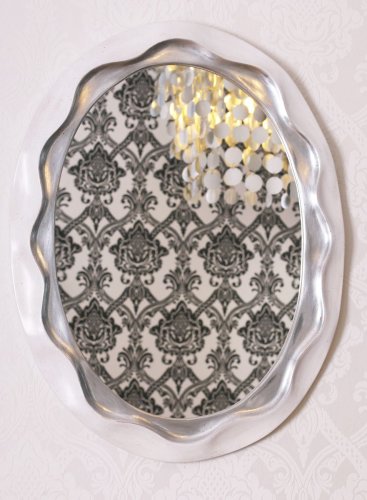 Oválné zrcadlo v luxusním kulatém rámu